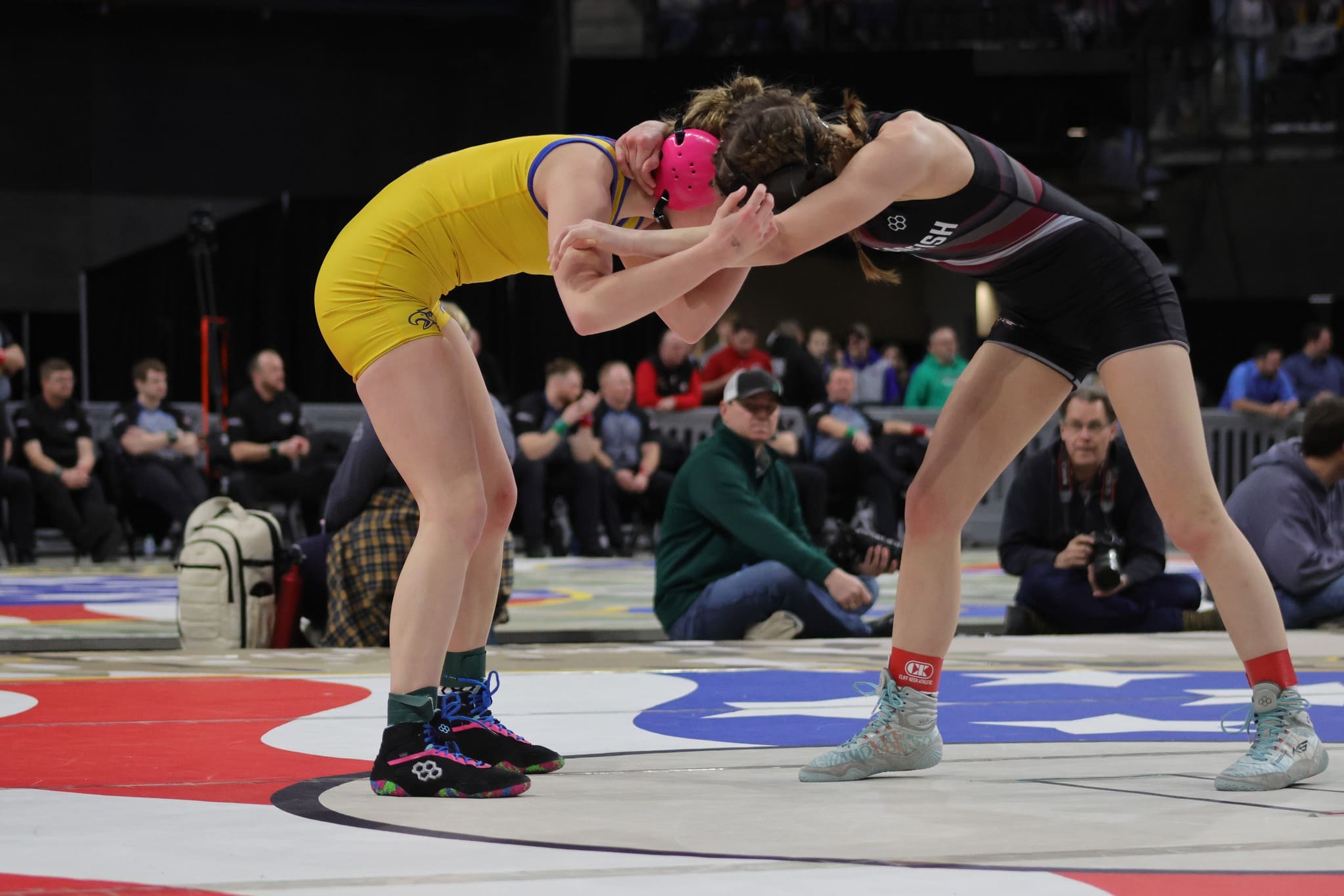 Haven Baker of the Spearfish Spartans Girls Wrestling Team competes in a match at the State Wrestling Tournament in Rapid City, captured by Odrix Sports.