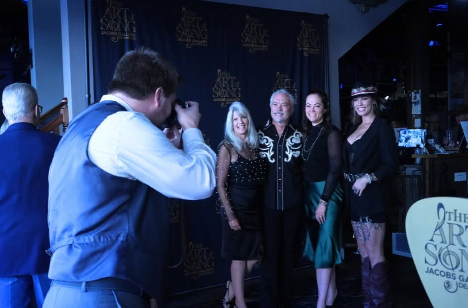 Event photographer capturing guests during The Art of Song event at Jacobs Gallery in Deadwood, South Dakota, photographed by Odrix Media.